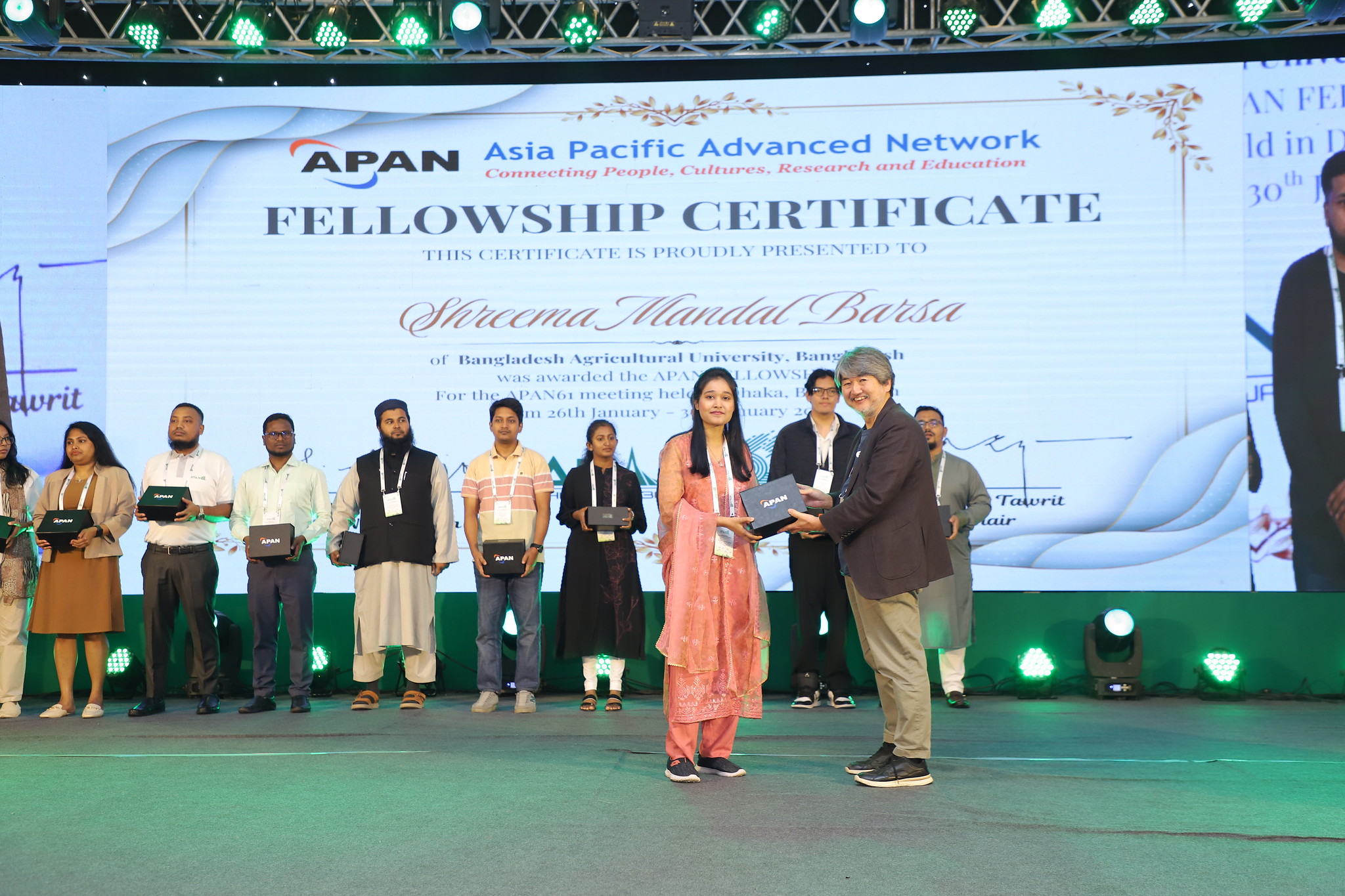 Fellowship Programme participants at APAN61 receiving their Fellowship Certificates.